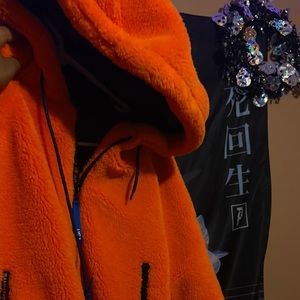 Orange nasa coat with reflective details